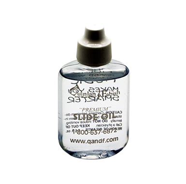 Clear bottle of slide oil
