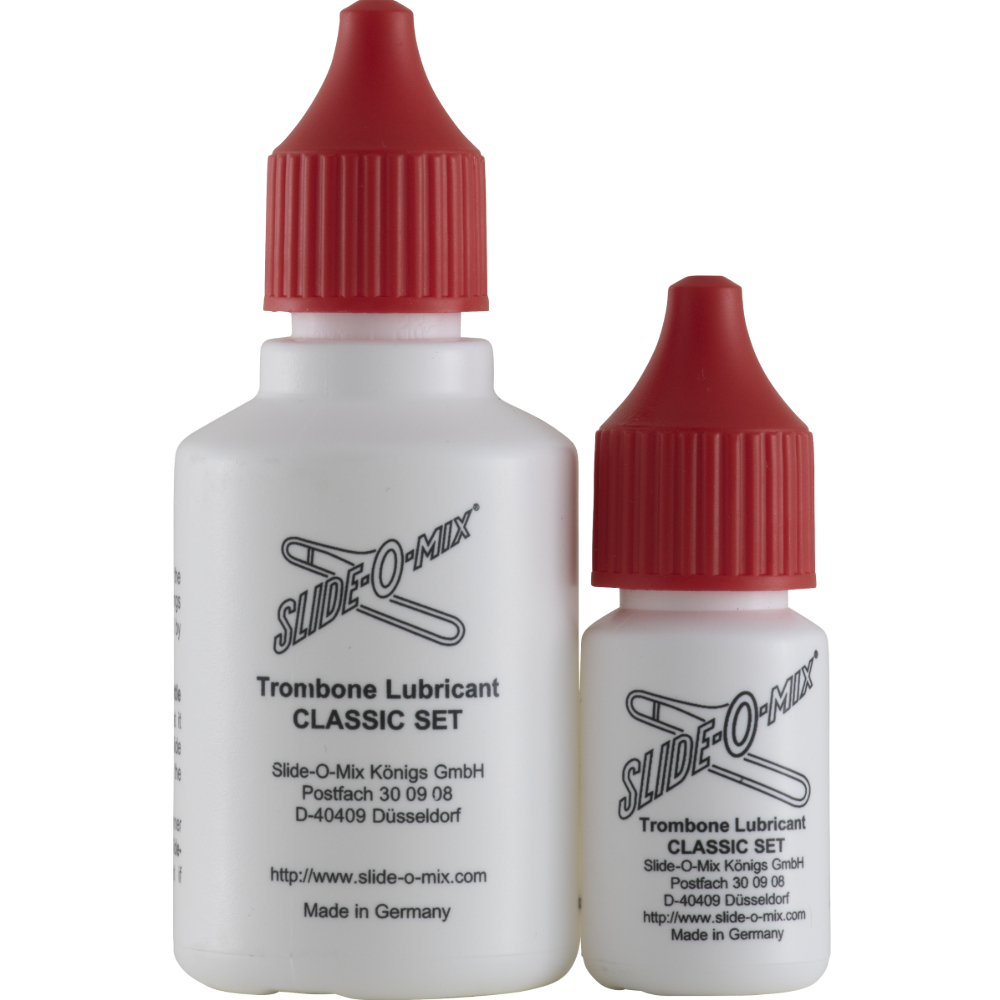 2 White Bottles of Slide O Mix hand slide lubricant with red caps